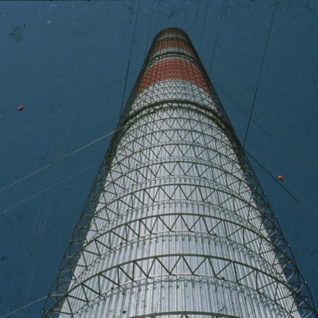 A view looking up at a solar chimney.